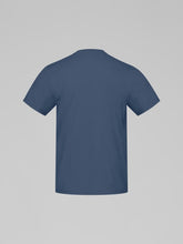 Load image into Gallery viewer, Blue t-shirt on a gray background
