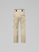 Load image into Gallery viewer, Beige work pants with zippers and straps on a gray background
