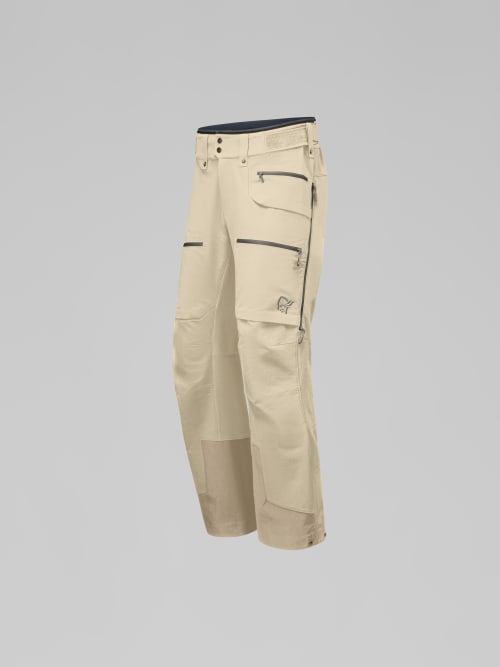 Beige pants with zippers on a gray background