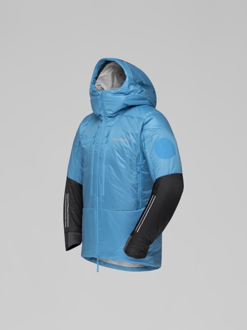 Blue jacket with black sleeves on a gray background