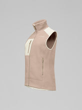 Load image into Gallery viewer, Brown fleece vest with white accents on a gray background
