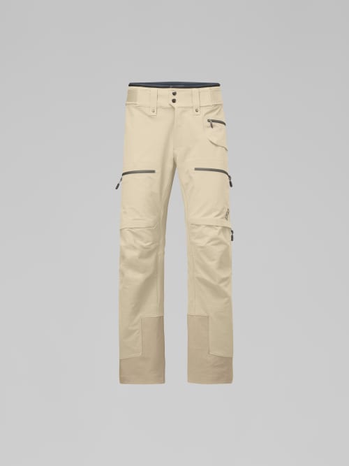 Beige pants with zippers on a gray background