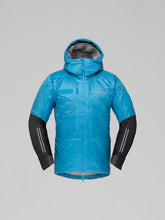 Load image into Gallery viewer, Blue winter jacket with black sleeves on a gray background
