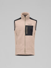 Load image into Gallery viewer, Beige fleece vest with a black pocket on a gray background
