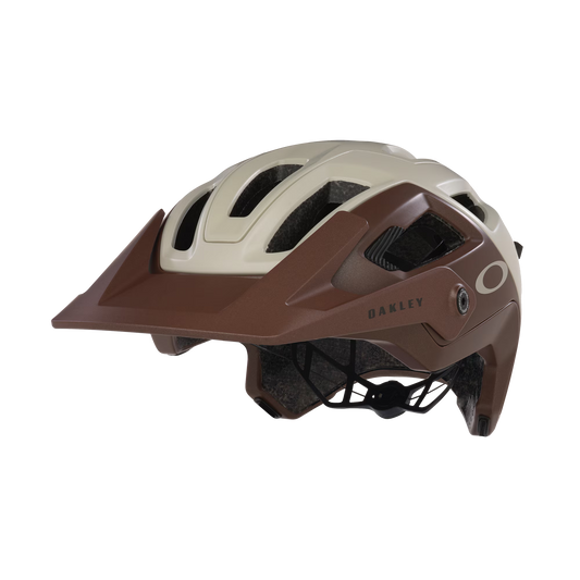Brown and beige helmet with 'Oakley' branding on a white background