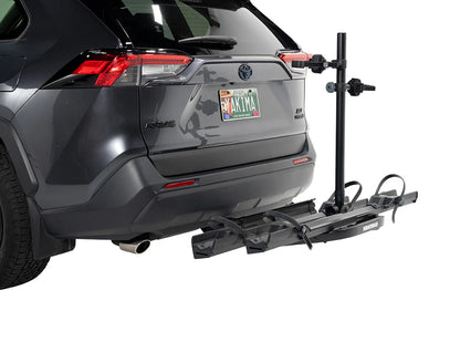 Car with a bike rack attached to the back, on a white background