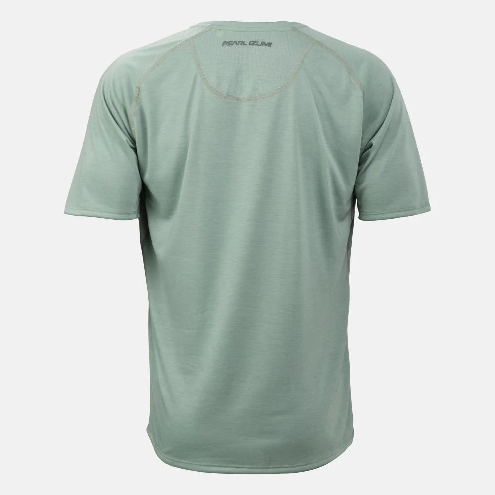 Green athletic shirt with brand logo on the back against a white background