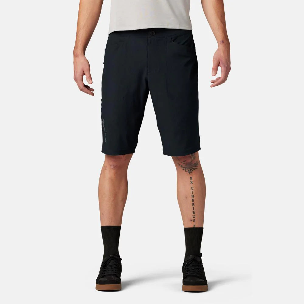 Person wearing black shorts on a white background