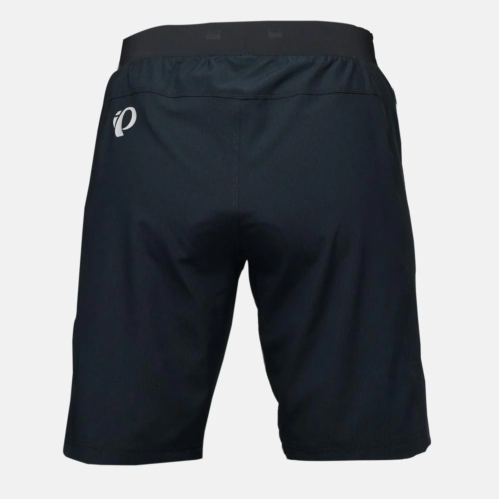 Black athletic shorts with a logo on a light gray background