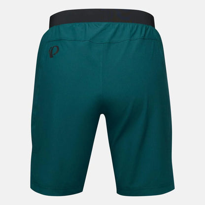 Teal shorts with a brand logo on a light gray background
