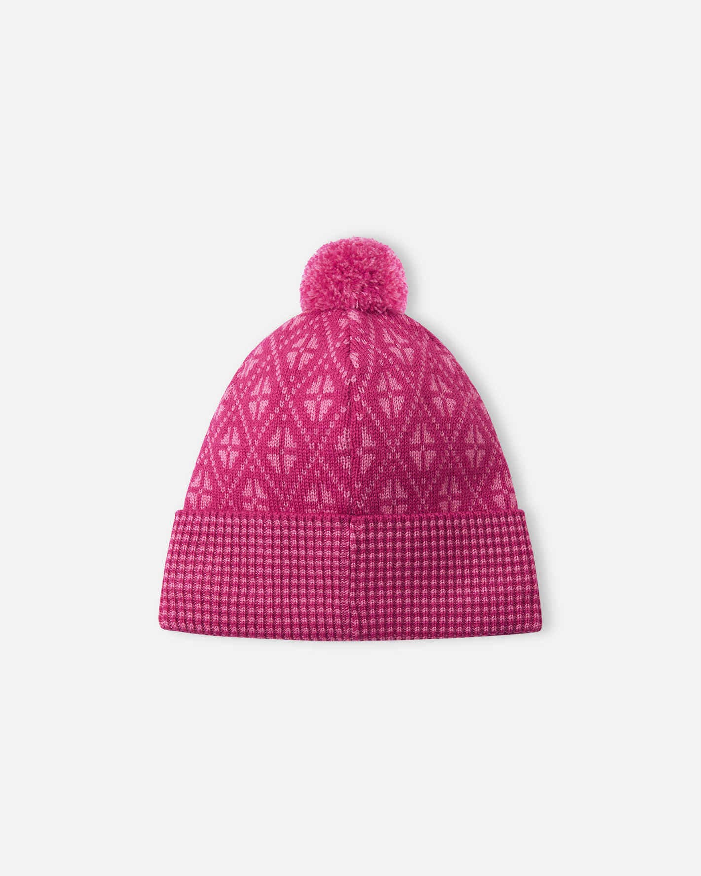 Pink knit beanie with a patterned top and textured bottom on a white background