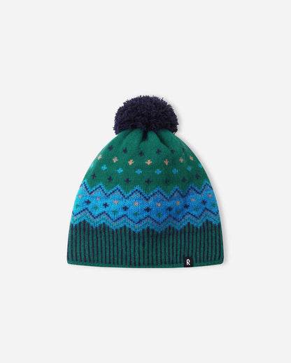 Knitted beanie with a patterned design on a white background