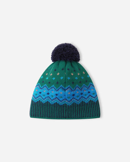 Knitted beanie with a patterned design and pom-pom on a white background