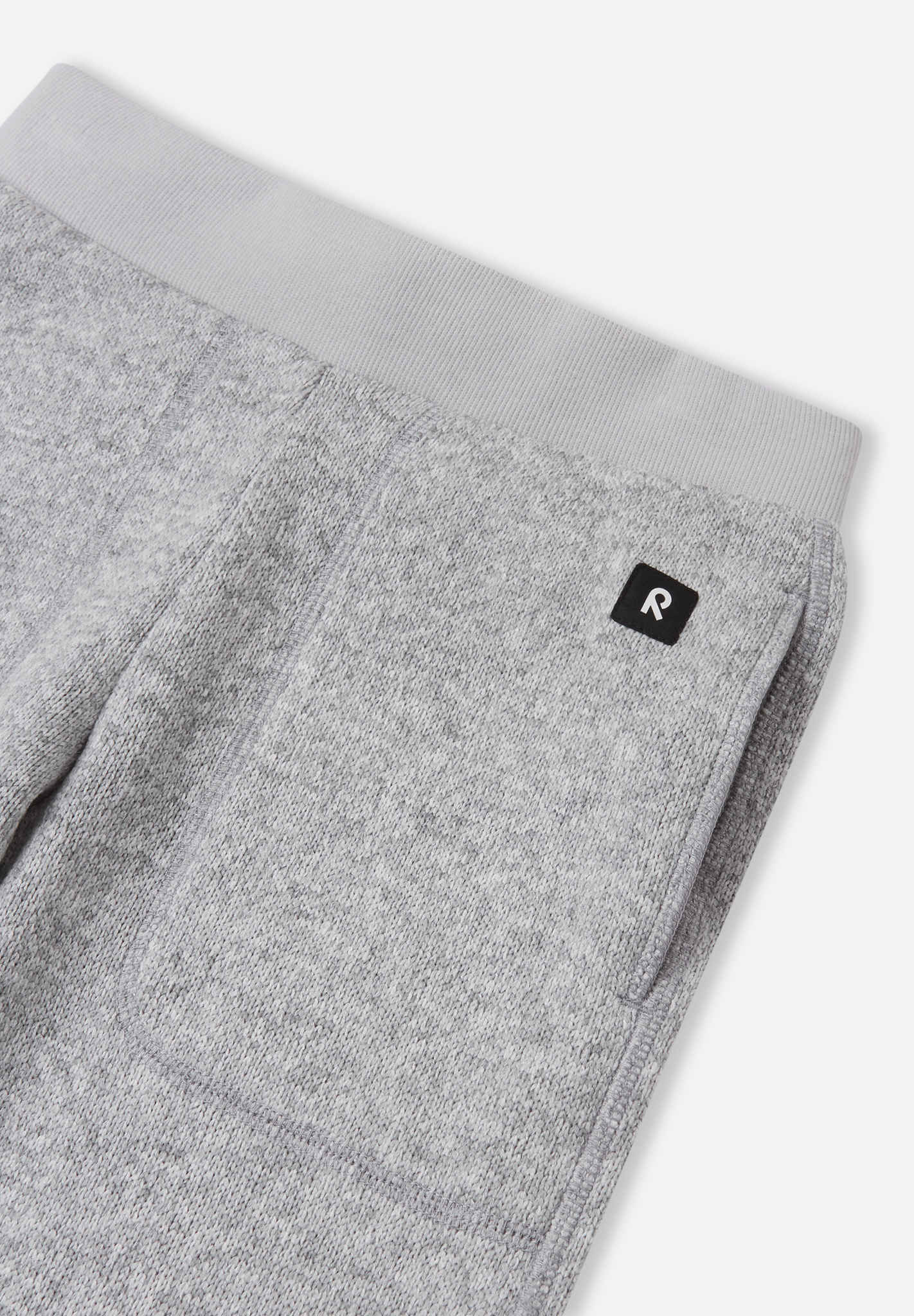 Gray sweatpants with a brand logo on a white background
