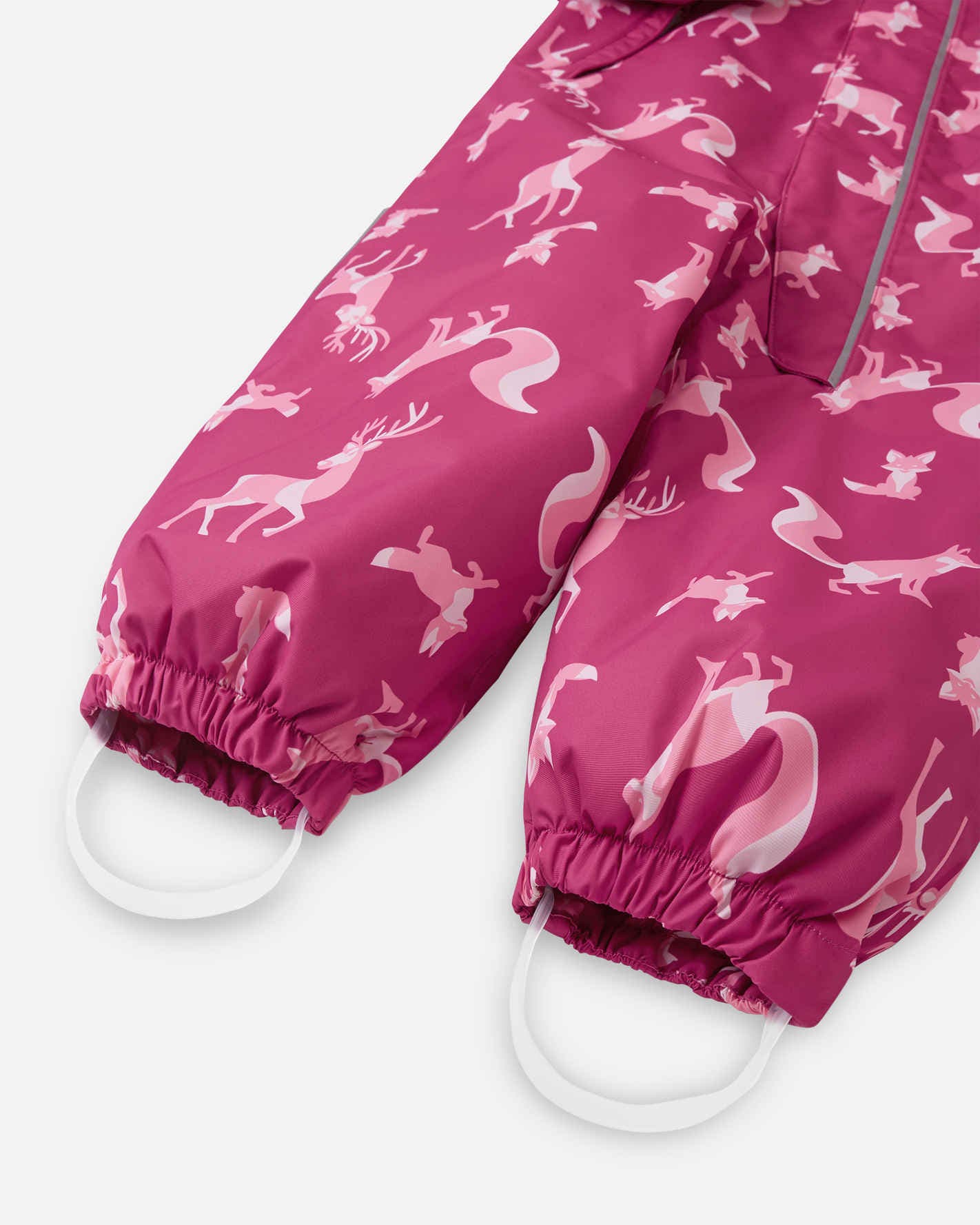 Pink children's rain pants with deer pattern on a white background