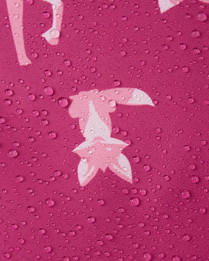 Pink fabric with star pattern and water droplets