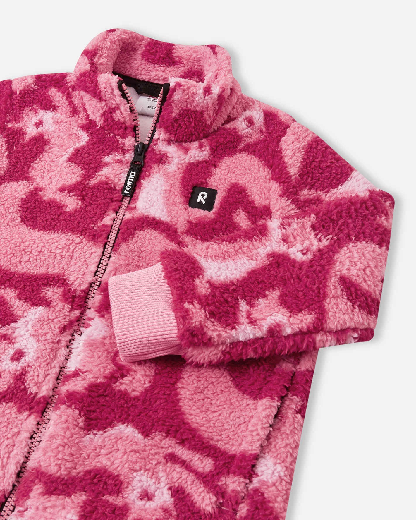 Pink camouflage fleece jacket with a brand logo on a light gray background
