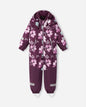 Purple children's snowsuit with floral pattern on a white background