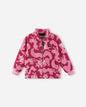 Pink fleece jacket with dragon pattern on a white background