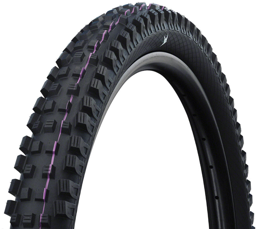 Close-up of a black bicycle tire with purple accents on a white background