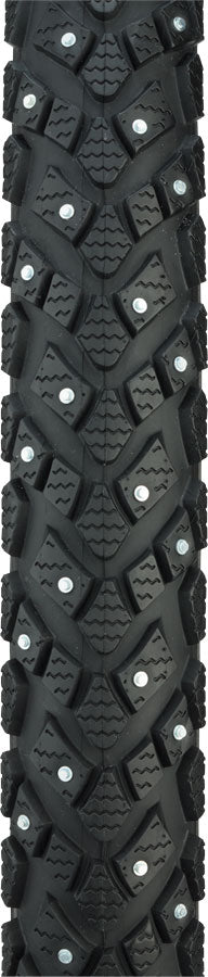 Tire with snow chain pattern on a black background