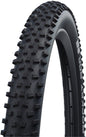 Close-up of a bicycle tire with tread pattern on a white background