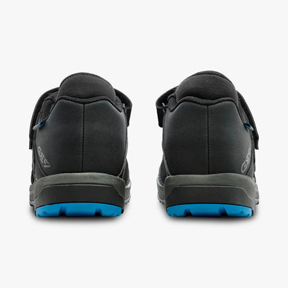 Black shoes with blue sole on a white background