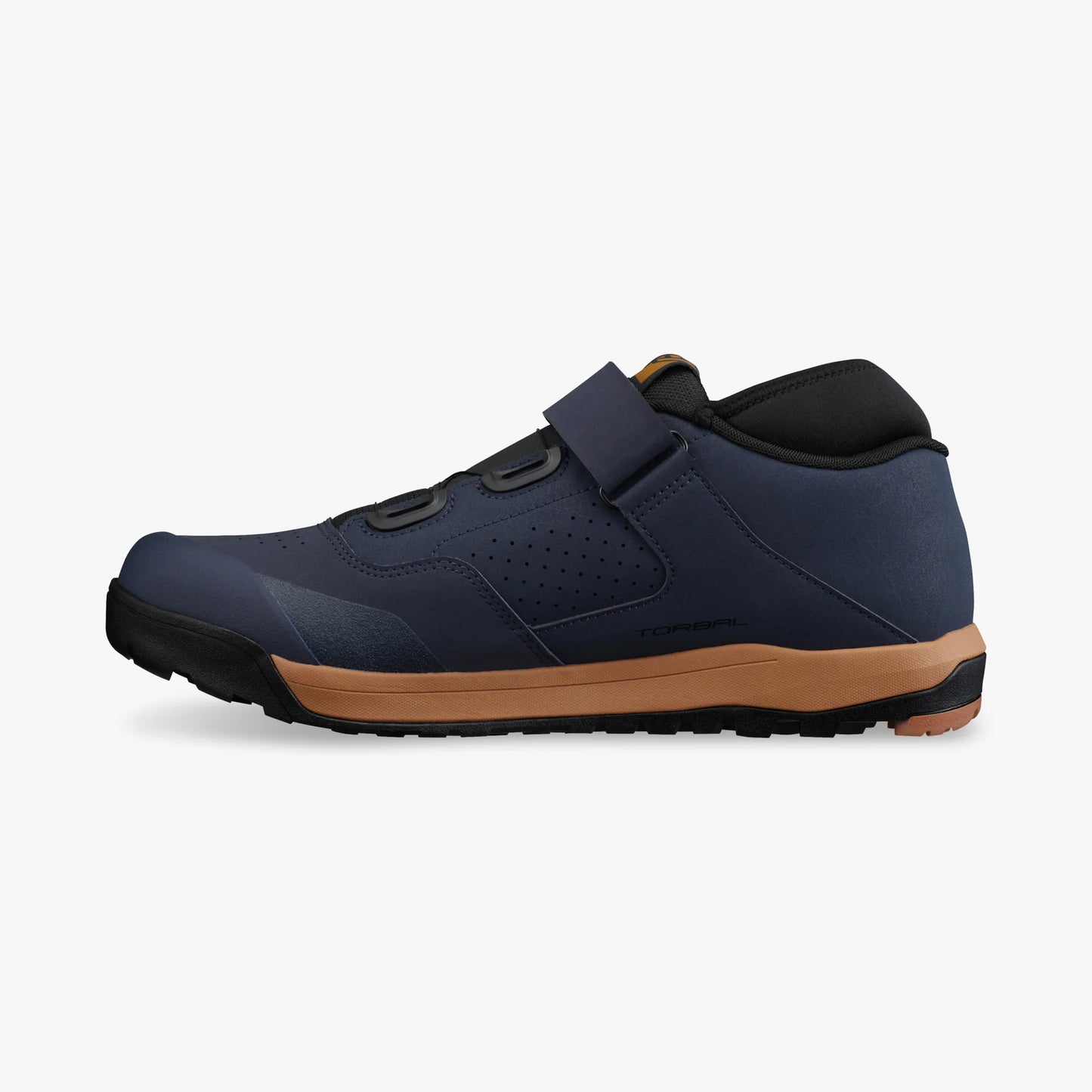 Navy shoe with brown sole on a white background
