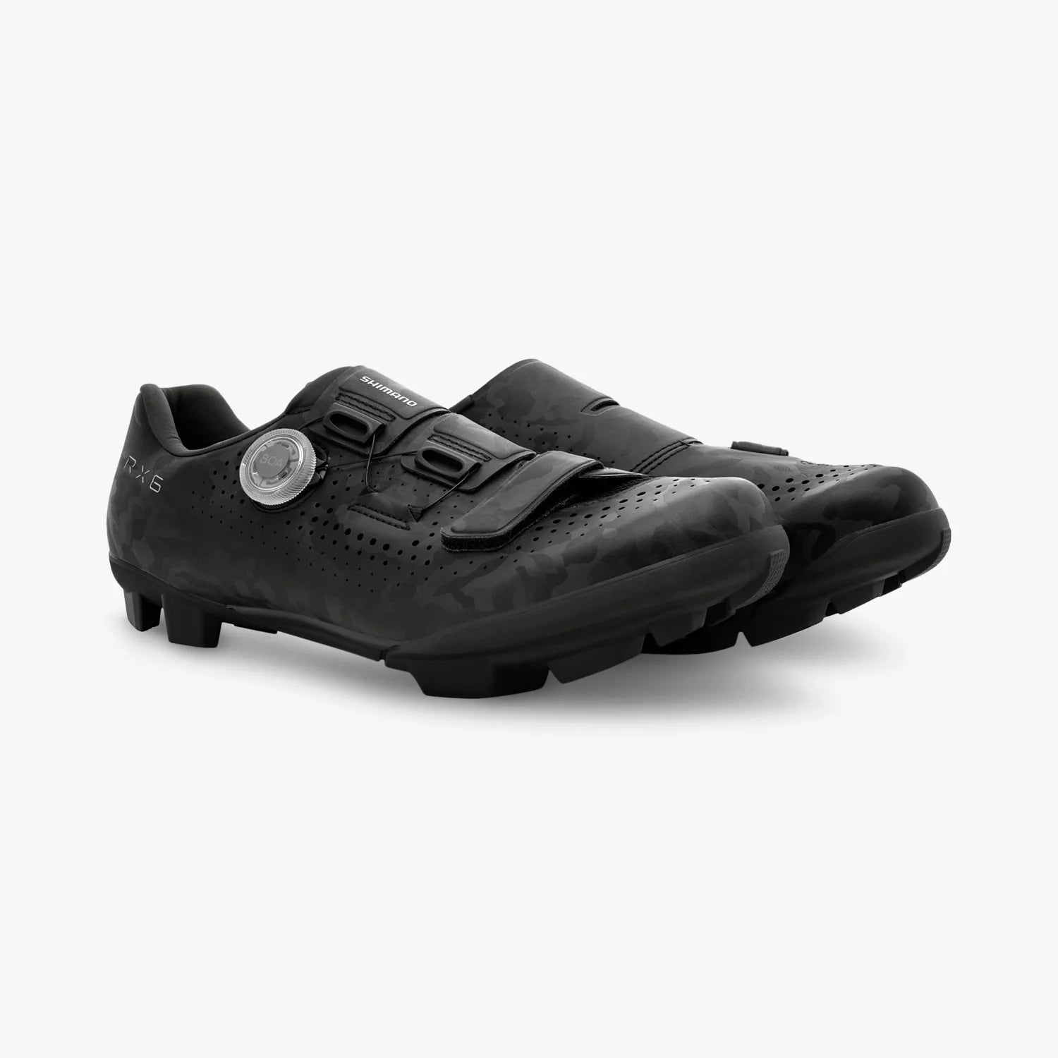 Pair of black cycling shoes on a white background