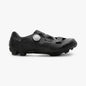 Black cycling shoe with 'RX6' branding on a white background