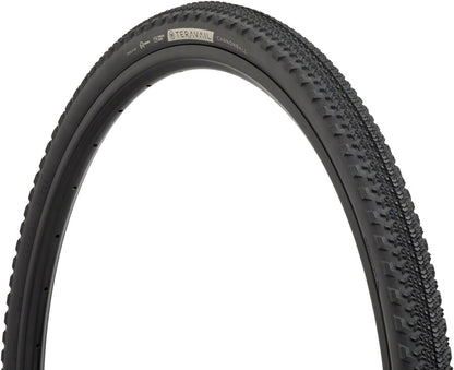 Close-up of a bicycle tire with tread pattern on a white background