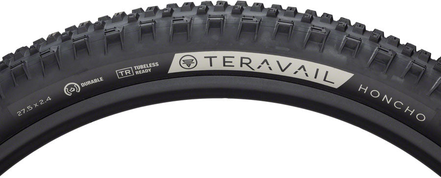 Close-up of a Teravail Honcho bicycle tire with tread pattern and branding.