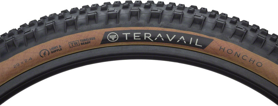 Close-up of a Teravail Honcho bicycle tire with tread pattern and branding.