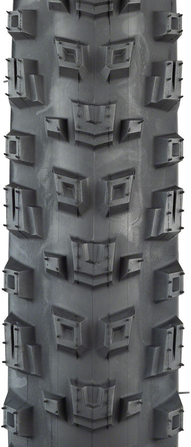 Tire with tread pattern showing geometric design