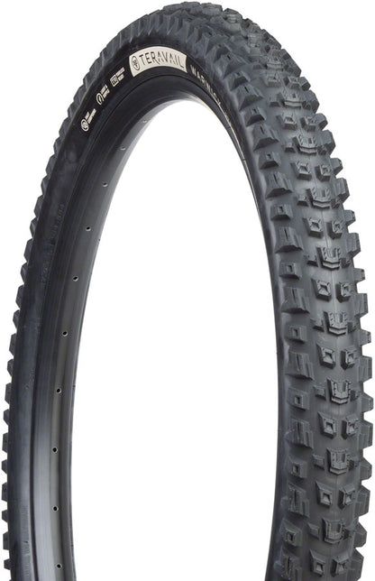 Black off-road tire with tread pattern on a white background