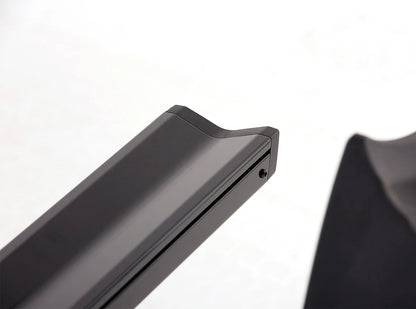 Close-up of a black bike tray on a white background