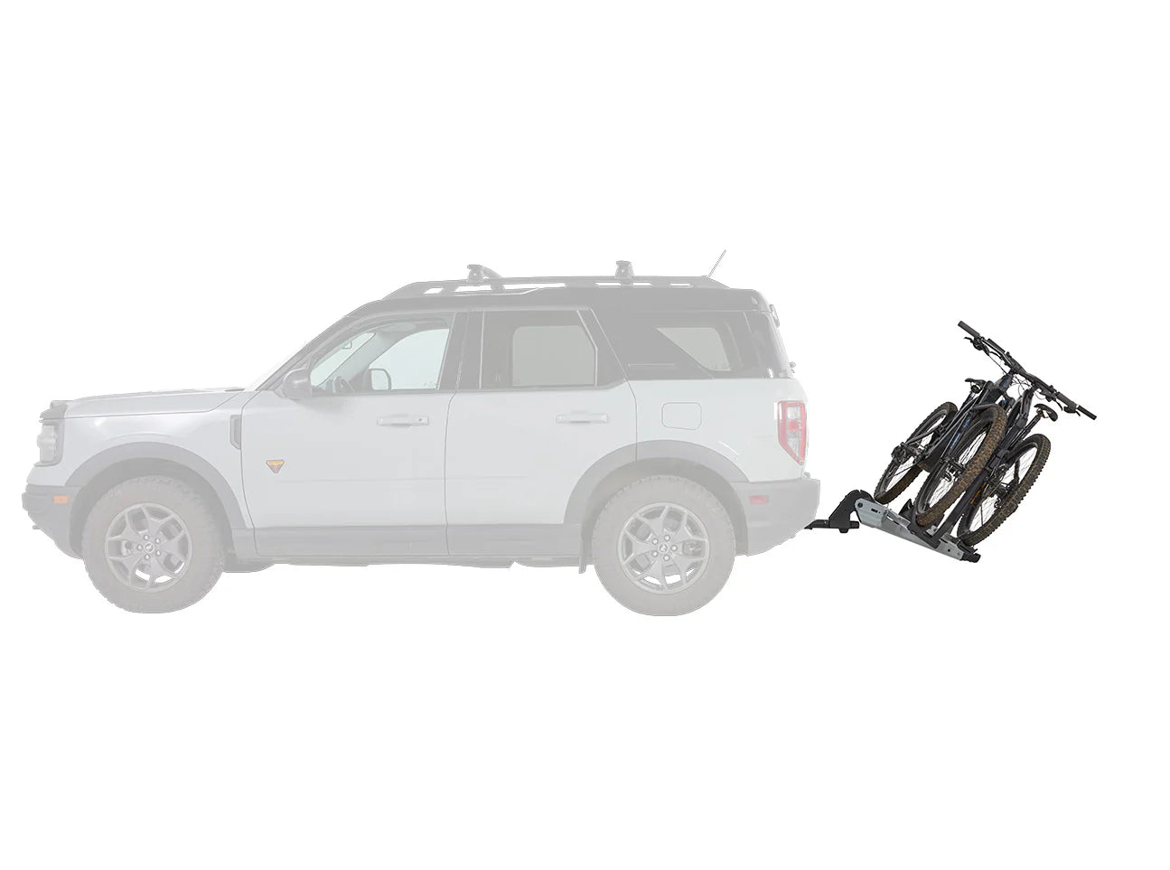 White SUV with a bike rack attached on a white background