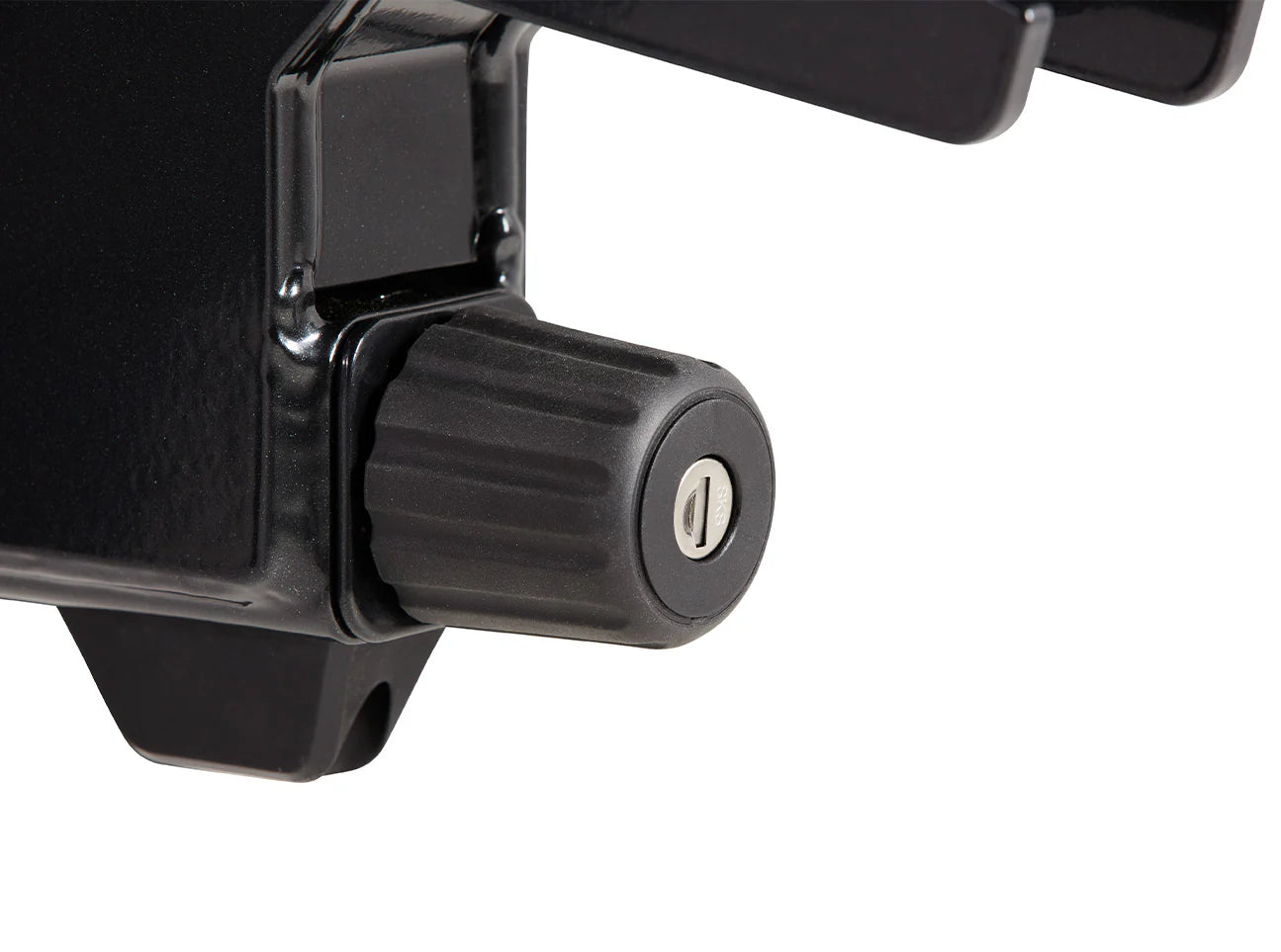 Close-up of a black adjustable stand with a knob on a white background