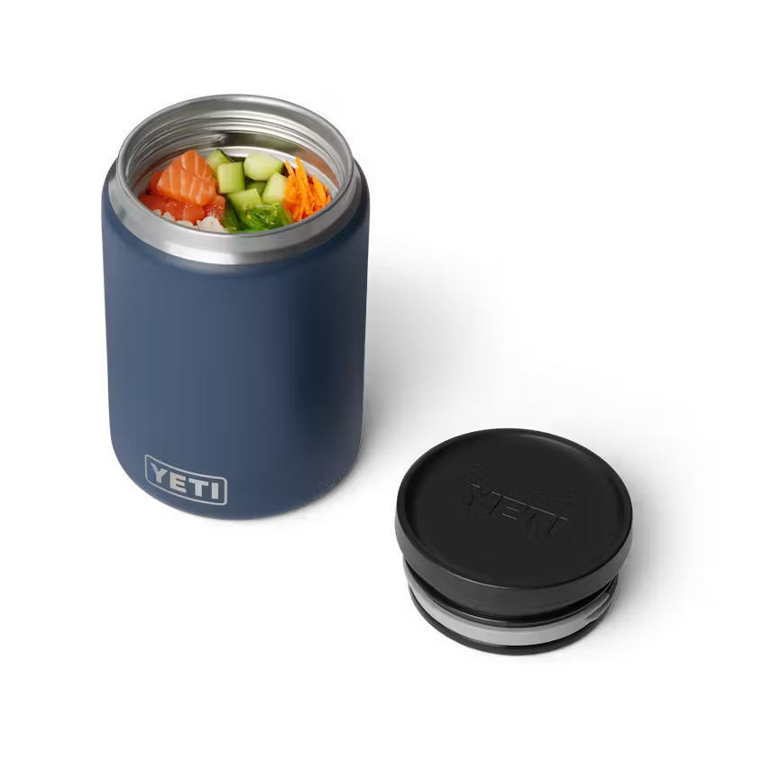 Blue YETI food container with black lid on a white background