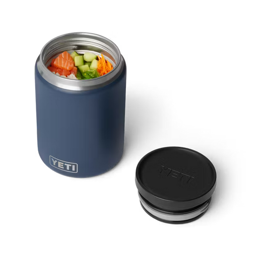 Blue YETI food container with black lid on a white background