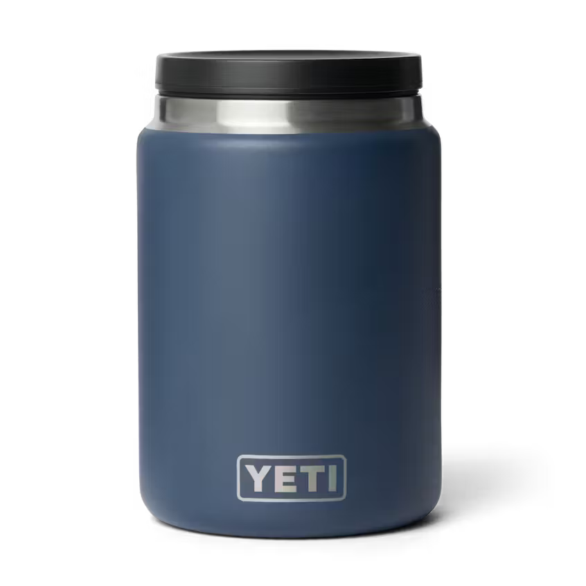 Blue YETI mug with a black lid on a white background
