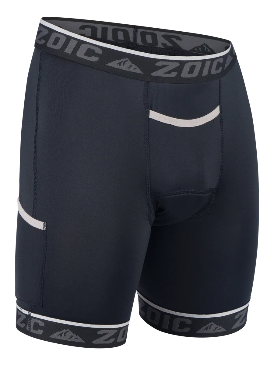 Black athletic shorts with white accents and 'Zoic' branding on a white background